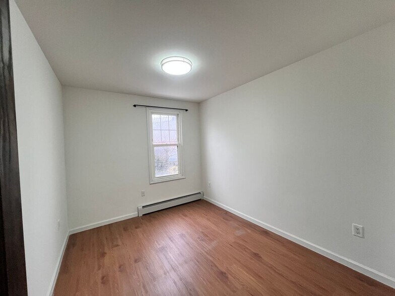 Building Photo - 64-03 Perry Ave