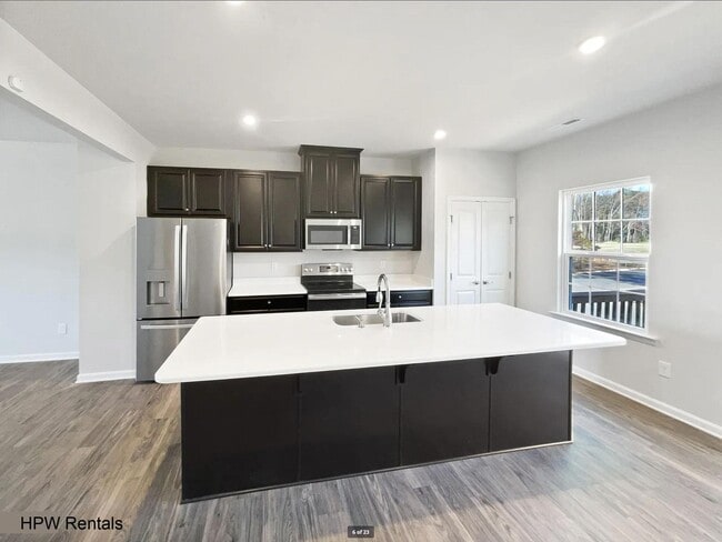 Building Photo - 3-Story End Unit Townhome with 3 Beds, 3 B...