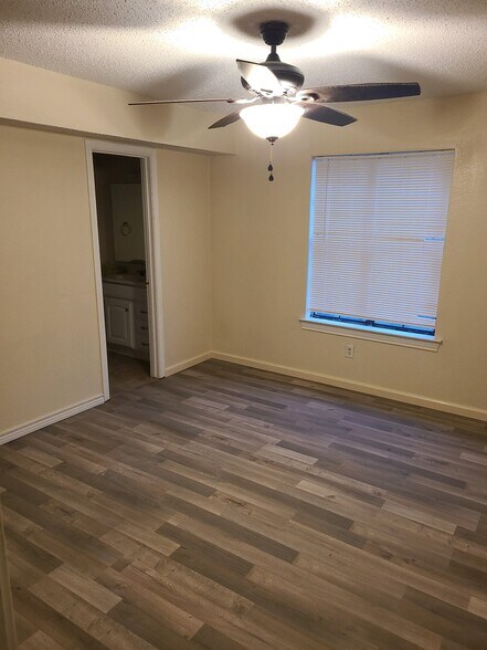 Photos of sample unit with identical layout - Masterbedroom with attached masterbathroom - 201 W Trinity St