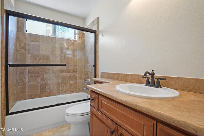 Building Photo - 6077 Mandeville Pl