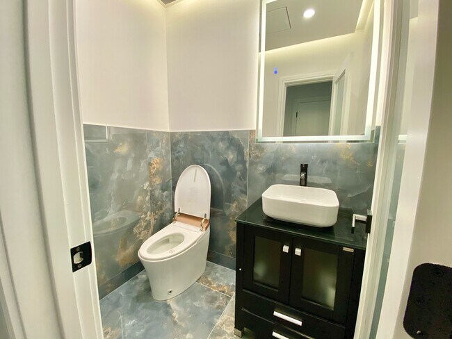 half bath - 611 W 49th St