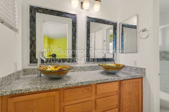 Building Photo - NW!! 4 Bedrooms!!! All Tile and Pergo flooring T/O!! NO Carpet!!! Low Maintenance Desert landscap...