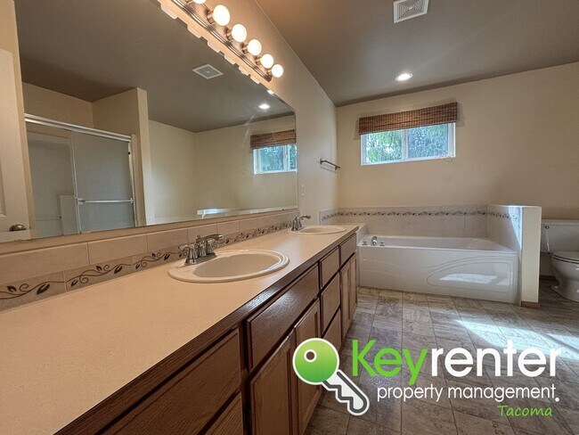 Building Photo - Elegant Browns Point Living with Backyard ...