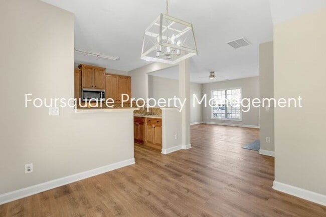 Building Photo - Cozy Townhome with Fireplace, Private Back Patio,  Near US-1, I-540 & Shopping