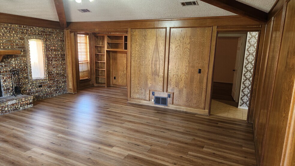 Custom paneling in Living Room - 509 Cedar Elm Ln