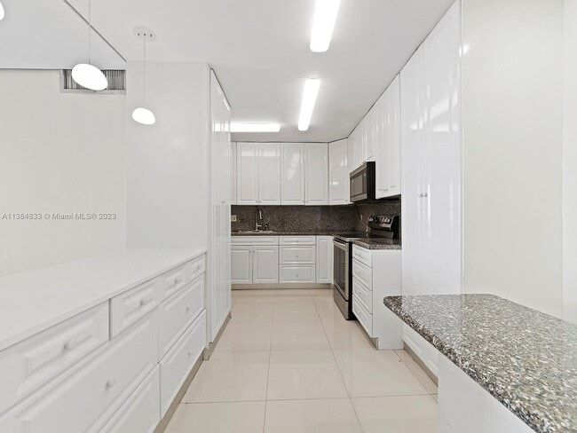 Building Photo - 9801 Collins Ave