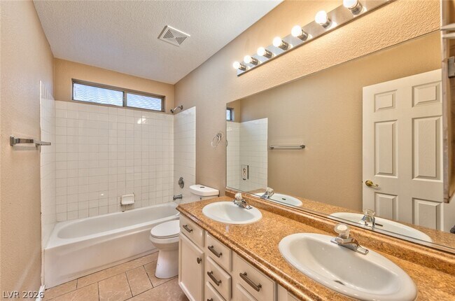 Building Photo - 8997 Living Rose St