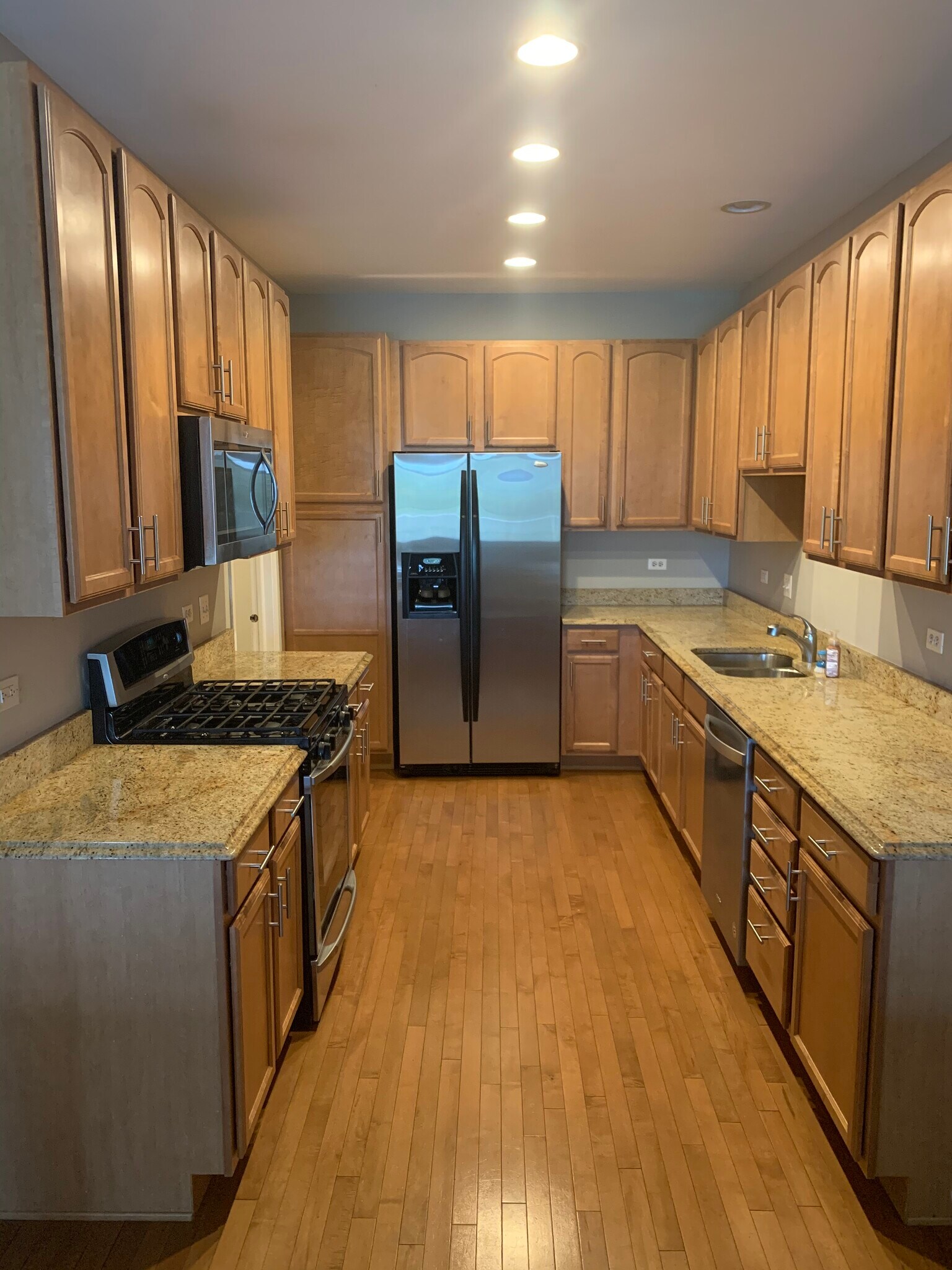Spacious galley kitchen with SS appliances - 281 Hickory Lane