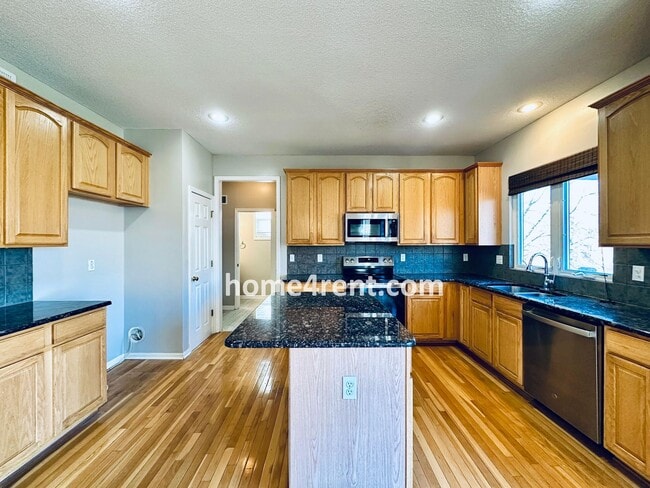 Building Photo - Gorgeous, Updated Home w/ Granite Counters and Wood Floors in Kitchen, Walkout Finished Basement!