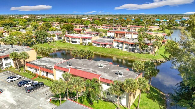 Building Photo - Desirable 55 plus community condo unit with a view of the lake on the 2nd Floor.