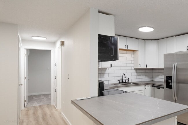 Building Photo - Remodeled 3 Bedroom 2 Bathroom Home, yard, carport