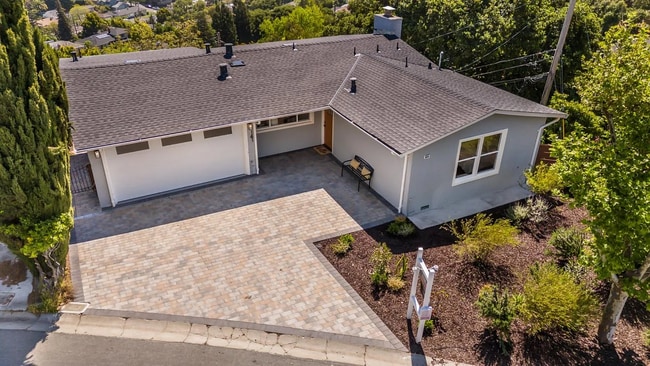 Building Photo - "Remodeled - Charming 3-Bed Sanctuary with...