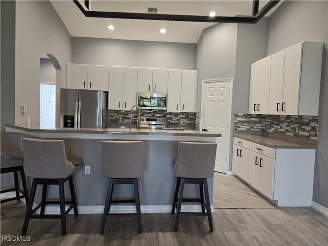 Building Photo - 14830 Calusa Palms Dr