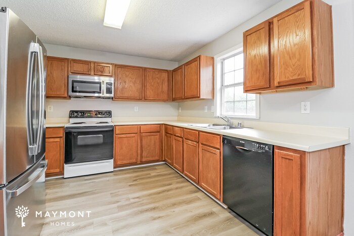 Building Photo - 8003 Mosstree Dr