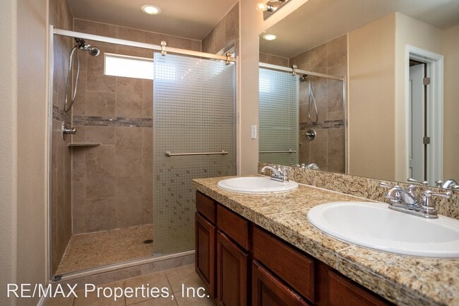 Building Photo - 4 br, 3.5 bath House - 8177 Kettle Drum St...