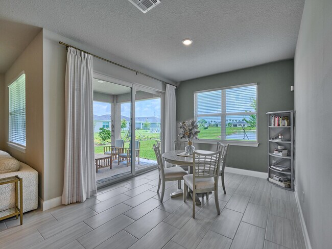 Building Photo - 8960 Dahlia Cir