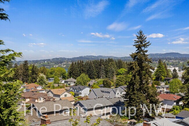 Building Photo - Picturesque Seattle Craftsman in a Private Bryn Mawr Enclave *Amazing Views *Central A/C *Tons of...