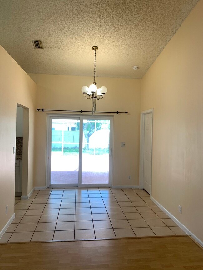 Building Photo - 9840 NW 28th Ct