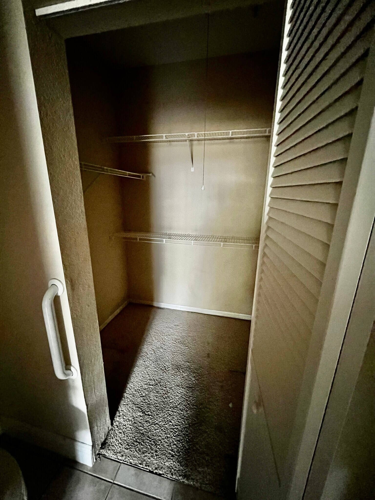 Guest walk-in closet - 6420 Raleigh St