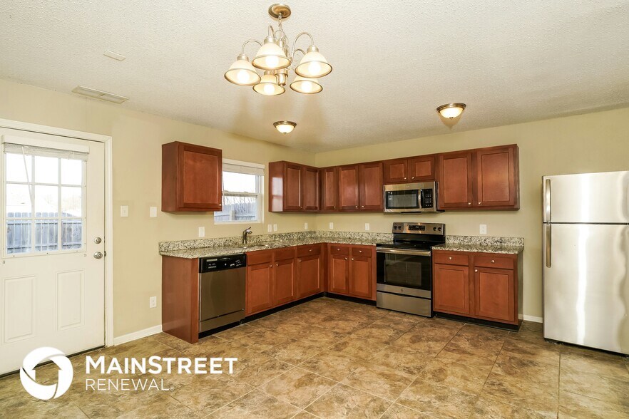 Building Photo - 9040 Wandflower Dr