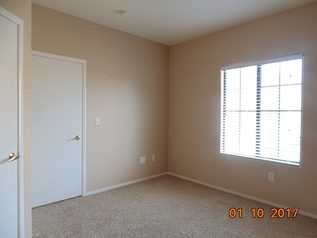 Building Photo - COZY 2 BEDROOM 2 FULL BATH CONDO LOCATED ON SECOND LEVEL