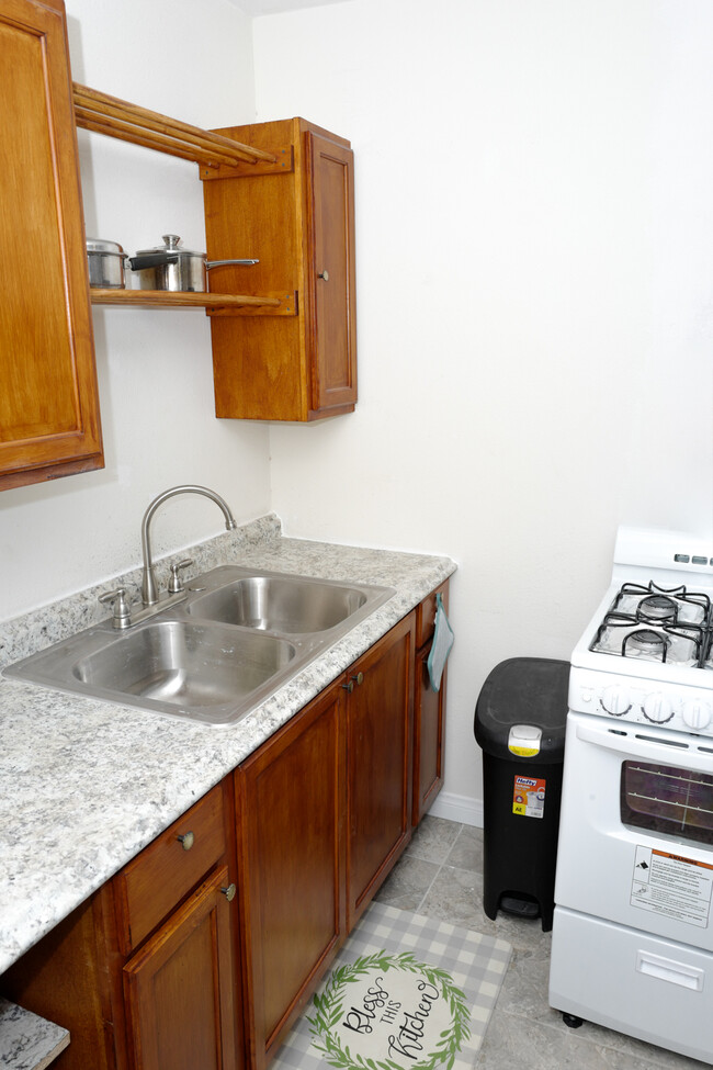 Apt Kitchen sink and stove - 501 Holick Ave