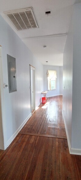 Hall from Living area to bathroom and Bedroom area. There is no door to the bedroom - 183 Alabama St
