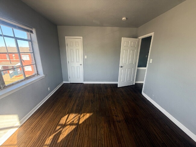 Building Photo - 2-Bedroom Townhome with Wood Floors