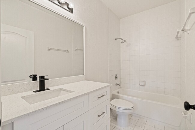Building Photo - 2-bath condo on the 2nd floor with a newly...