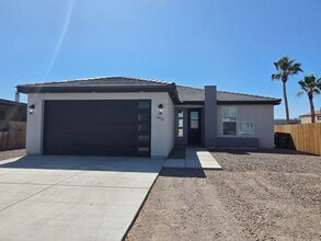 Building Photo - Beautiful new build-Never been lived in with pull through 3 car garage in Fort Mohave AZ