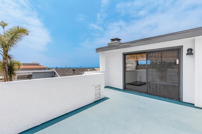 Building Photo - Modern Elegance Meets Ocean Breezes – Full...
