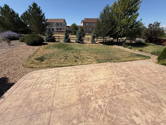 Building Photo - Greenbelt-Backed Wheatlands Home - Mountain Views, 3 Car Garage & Finished Basement