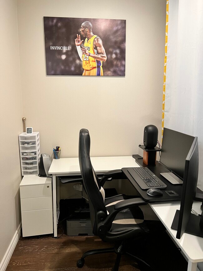 One area of the downstairs family room partitioned for a spacious home office - 89 E Commonwealth Ave