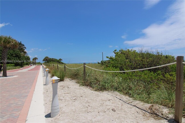 Building Photo - 5005 Collins Ave