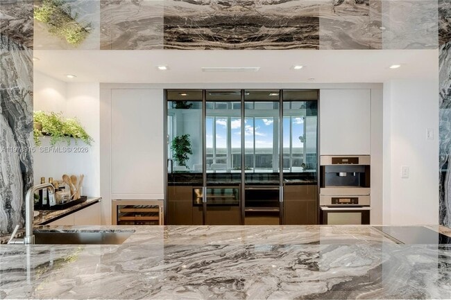 Building Photo - 18201 Collins Ave