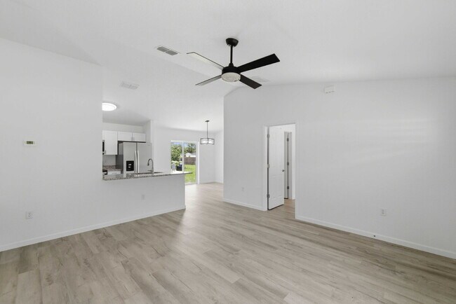 Building Photo - Available Now! New 3/2 Home with Large Backyard and Front Porch