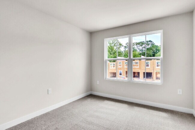Building Photo - Modern New, Never Lived-in 3BR/2.5BA Townh...
