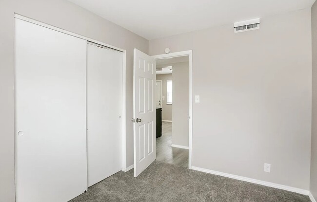 Fresh carpeted bedrooms with closet spaces and beautiful lighting as well. - 1902 E Calvert St