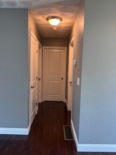 Hallway leading to basement, bedrooms and bathroom. - 71 Carlton St