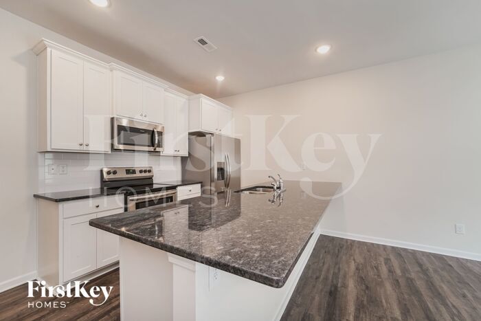 Building Photo - 10740 Rivergate Dr NW