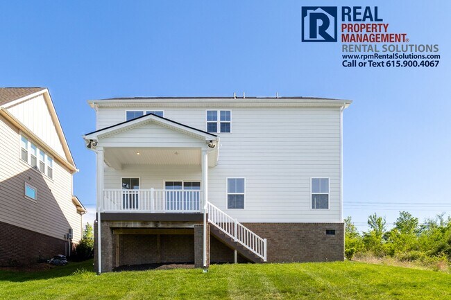 Building Photo - Great 4 bd 2.5 ba with attached garage and large deck!