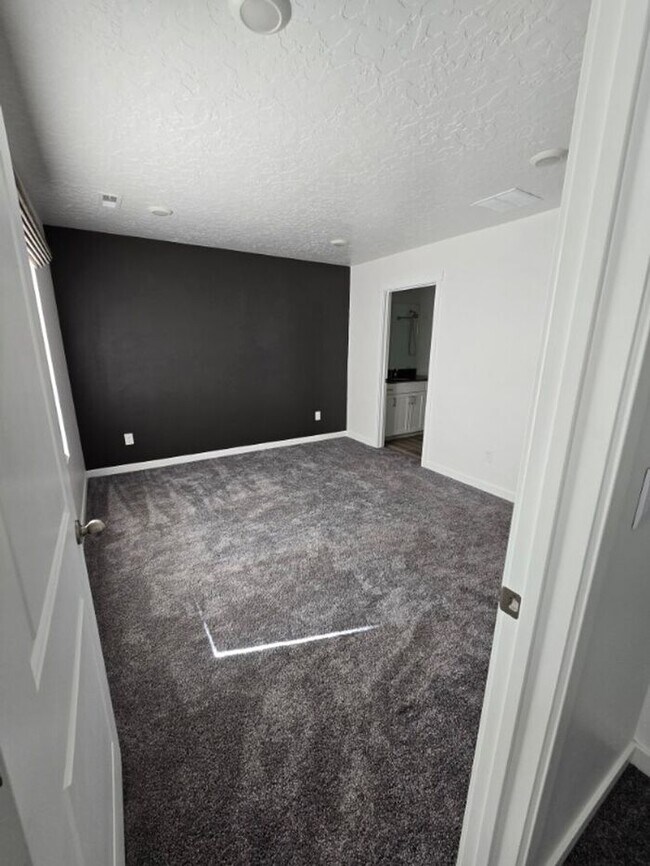 Building Photo - Nearly New, Well Appointed Modern Townhouse w 2 car attached garage