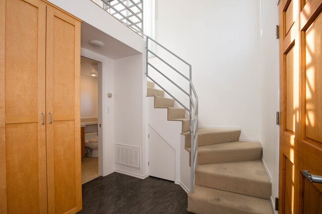 downstairs closet, bathroom, stairs to mezz. - 3016 Ruskin St
