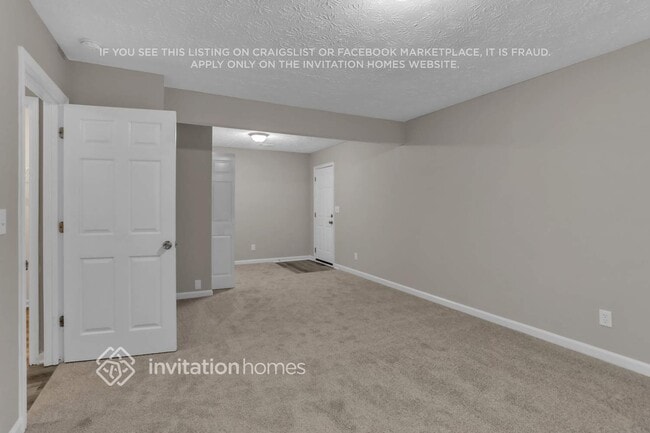 Building Photo - 6017 Happy Trails Ct