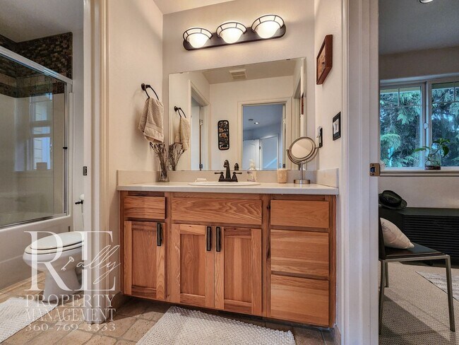 Building Photo - Light-Filled View Home with Vaulted Ceilings & Warm Wood Finishes