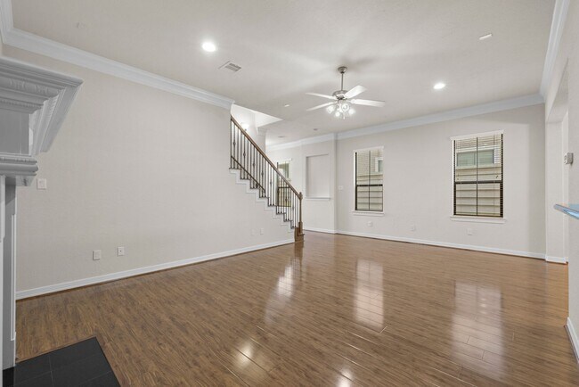 Building Photo - Luxury Townhome with Attached Garage & Outdoor Entertaining Area - $100 off first and second mont!