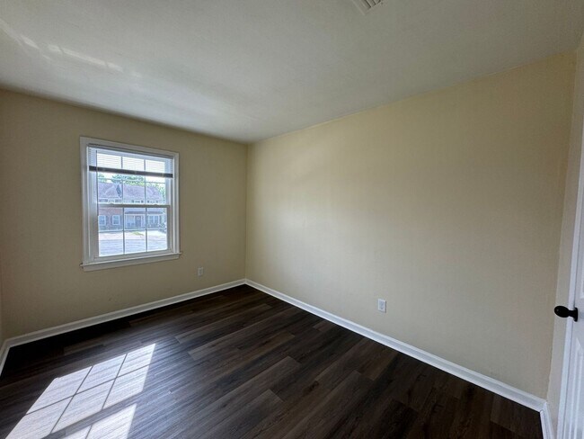 Building Photo - Introducing a newly renovated town-home "A...