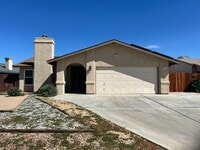 Building Photo - Please call Vaughn Realty, 760-446-6561 to...