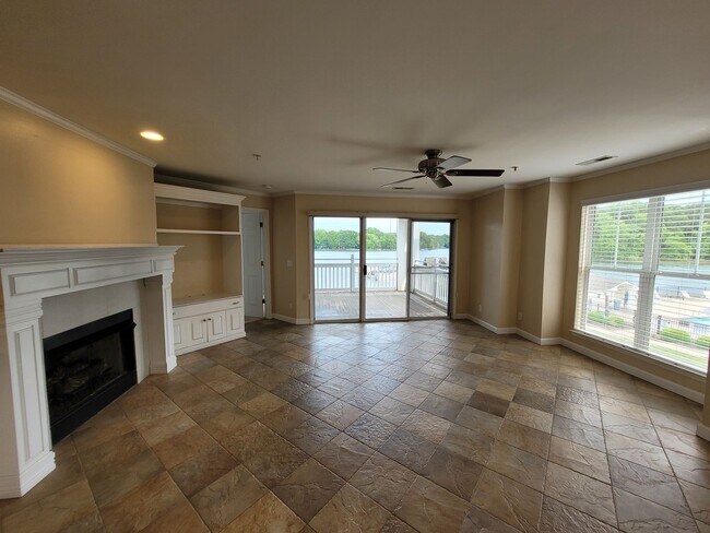 Building Photo - WATERFRONT - 3 Bed/2 Bath Condo - End Unit - Stunning View - Lake Access - Community Pool - Tenni...