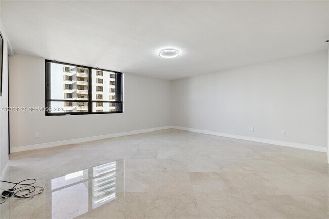 Building Photo - 10175 Collins Ave